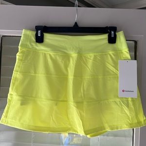 NWT Lululemon Pace Rival Mid-Rise Skirt w/Biker Shorts in Electric Lemon. Size 6